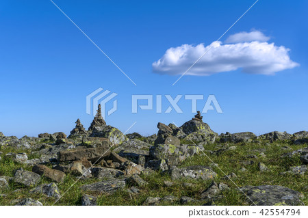 stone pyramids on a mountain plateau stone pyramids on a mountain plateau 42554794
