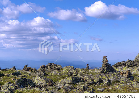 stone pyramids on a mountain plateau stone pyramids on a mountain plateau 42554795