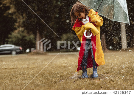 Playful kid spending time outdoors 42556347