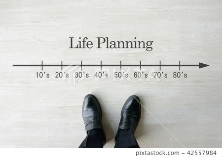 A businessman who thinks about life planning A businessman who thinks about life planning 42557984