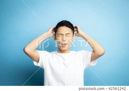 Male portrait facial expression 42561242