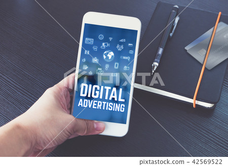 Hand holding mobile with digital advertising 42569522