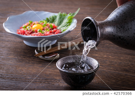 Sake and horse meat Yukke Sake and horse meat Yukke 42570366