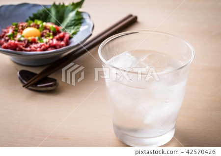 Shochu and horsemeat Yukke Shochu and horsemeat Yukke 42570426