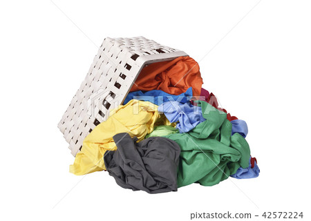 Colorful clothes spilled from wooden basket Colorful clothes spilled from wooden basket 42572224