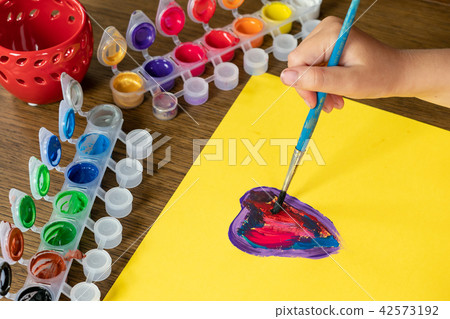 Child painting a picture. Child painting a picture. 42573192