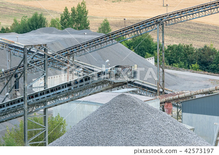 Belt conveyors and mining equipment in a quarry. Belt conveyors and mining equipment in a quarry. 42573197