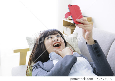 Sumaho Business Woman Relaxation Living Sofa Lifestyle Sumaho Business Woman Relaxation Living Sofa Lifestyle 42574009