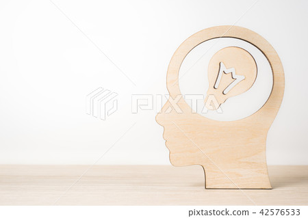 wooden man silhouette head with light bulb wooden man silhouette head with light bulb 42576533