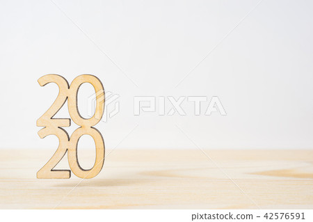 wooden word " 2020 " on table and white background wooden word " 2020 " on table and white background 42576591