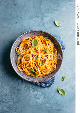 Italian pasta with tomato sauce in bowl 42579238