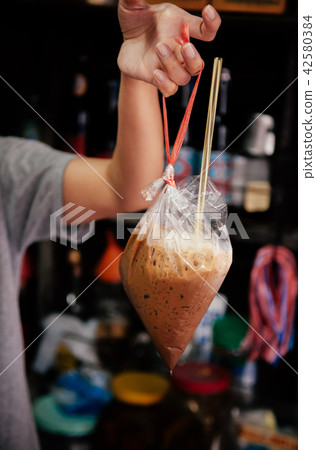 Thai traditional iced coffee in plastic bag Thai traditional iced coffee in plastic bag 42580384