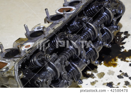 The head of the block of cylinders. The head of the block of cylinders removed from the engine for The head of the block of cylinders. The head of the block of cylinders removed from the engine for 42580478