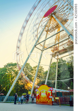 Motion Blur Ferris Wheel at Sunset Motion Blur Ferris Wheel at Sunset 42580993
