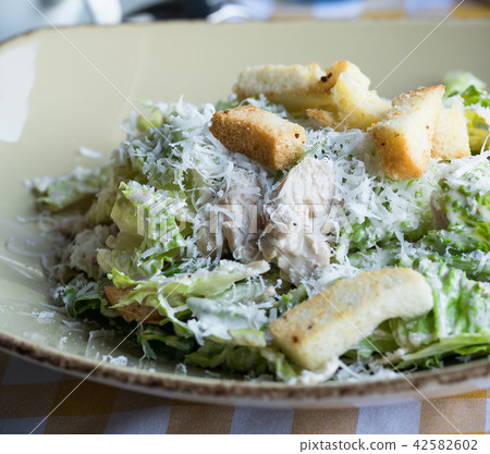chicken salad, beige plate, professionally made 42582602