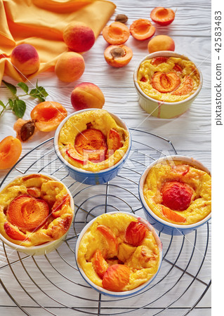 french summer dessert - Baked apricot clafoutis 42583483