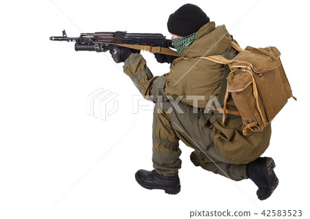 fighter with ak-47 rifle 42583523