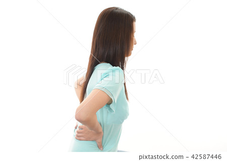 A woman complaining of low back pain 42587446