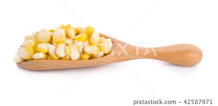 Fresh corn in wooden scoop isolated on white Fresh corn in wooden scoop isolated on white 42587971