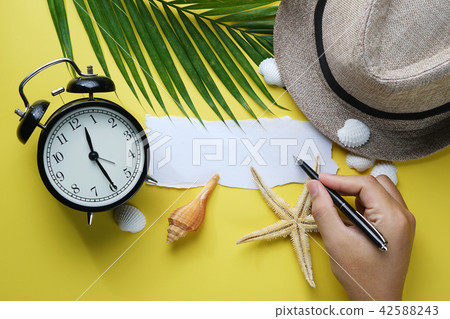 Blank Ripped Paper and Hand Holding Pen 42588243