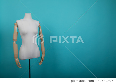 Mannequin positioned on a bright background Mannequin positioned on a bright background 42589897