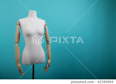 Mannequin positioned on a bright background Mannequin positioned on a bright background 42589904