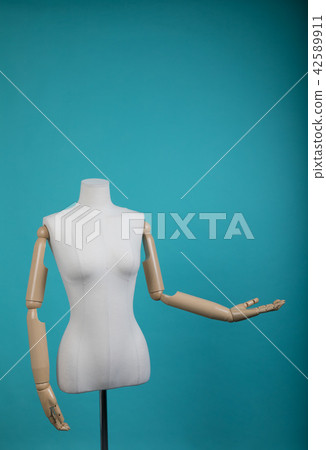 Mannequin positioned on a bright background Mannequin positioned on a bright background 42589911