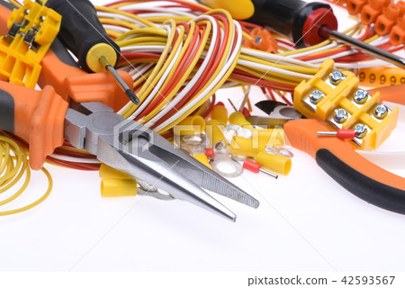 Set of electrical tools and cables on white Set of electrical tools and cables on white 42593567