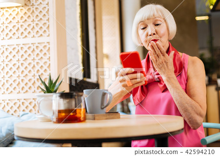 Joyful happy woman sending a kiss Joyful happy woman sending a kiss 42594210