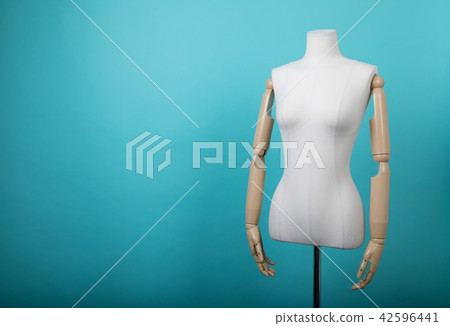 Mannequin positioned on a bright background 42596441