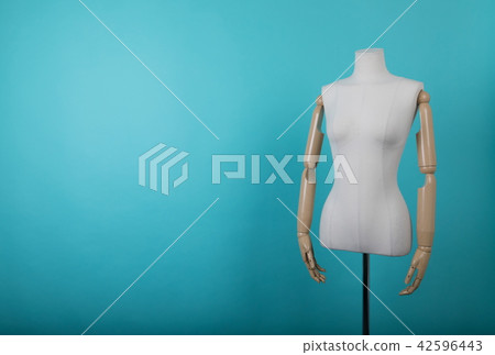 Mannequin positioned on a bright background Mannequin positioned on a bright background 42596443