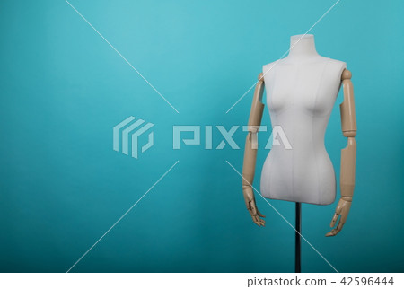 Mannequin positioned on a bright background Mannequin positioned on a bright background 42596444
