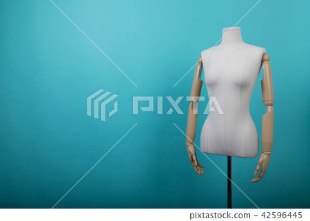 Mannequin positioned on a bright background Mannequin positioned on a bright background 42596445