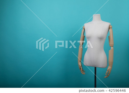 Mannequin positioned on a bright background Mannequin positioned on a bright background 42596446