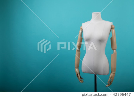 Mannequin positioned on a bright background Mannequin positioned on a bright background 42596447