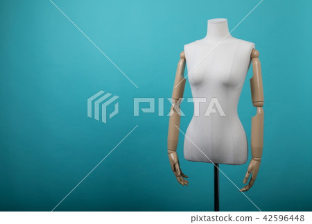 Mannequin positioned on a bright background Mannequin positioned on a bright background 42596448