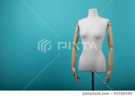 Mannequin positioned on a bright background Mannequin positioned on a bright background 42596449