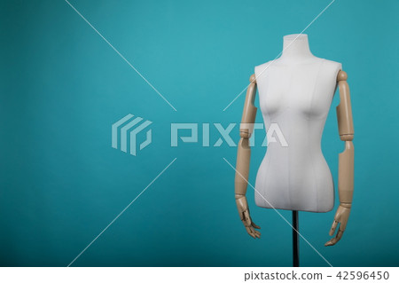 Mannequin positioned on a bright background Mannequin positioned on a bright background 42596450