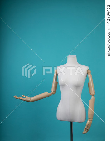 Mannequin positioned on a bright background Mannequin positioned on a bright background 42596452
