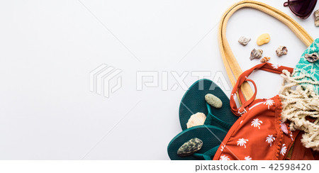 Beach female fashion accessories on white Beach female fashion accessories on white 42598420