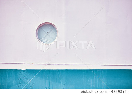 An old ship side with porthole. An old ship side with porthole. 42598561