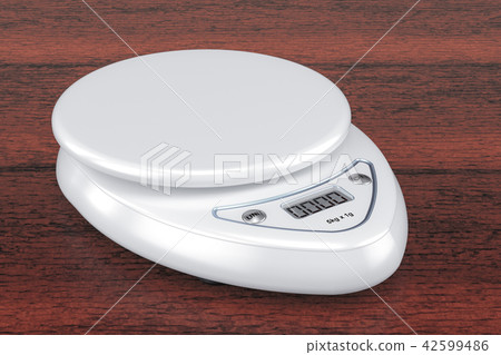 Digital Kitchen Scale on the wooden table Digital Kitchen Scale on the wooden table 42599486