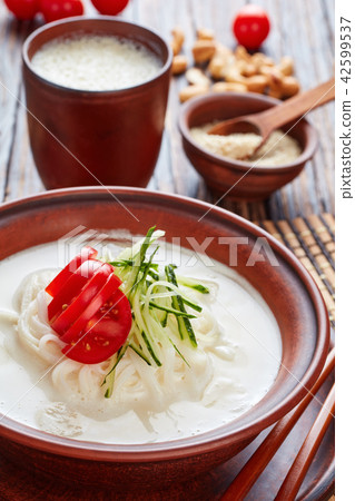kong-guksu - cold korean soup, top view kong-guksu - cold korean soup, top view 42599537