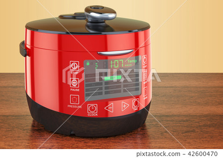 Red Automatic Multicooker on the wooden table Red Automatic Multicooker on the wooden table 42600470