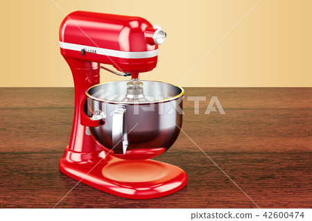 Red stand kitchen mixer on the wooden table 42600474
