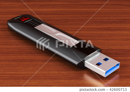 USB flash drive on the wooden table. 3D rendering USB flash drive on the wooden table. 3D rendering 42600713
