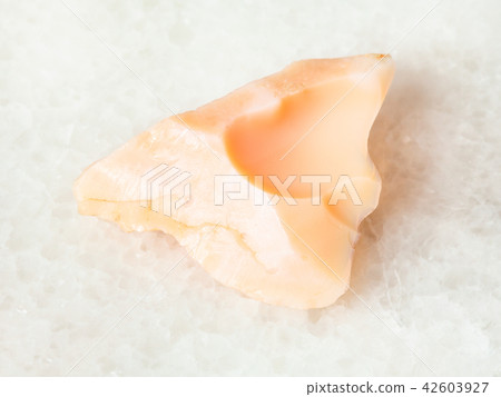 rough precious opal gemstone on white rough precious opal gemstone on white 42603927