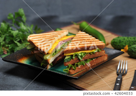 triangular shaped sandwiches with ham  42604033