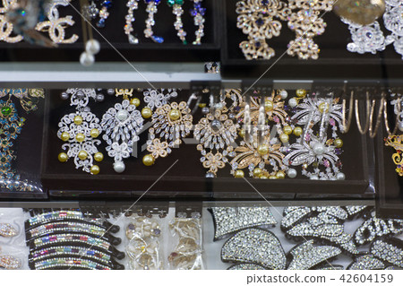 Many different woman jewellery and accessory 42604159