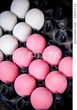 A Pile of Preserved pink century eggs, salted eggs A Pile of Preserved pink century eggs, salted eggs 42605113